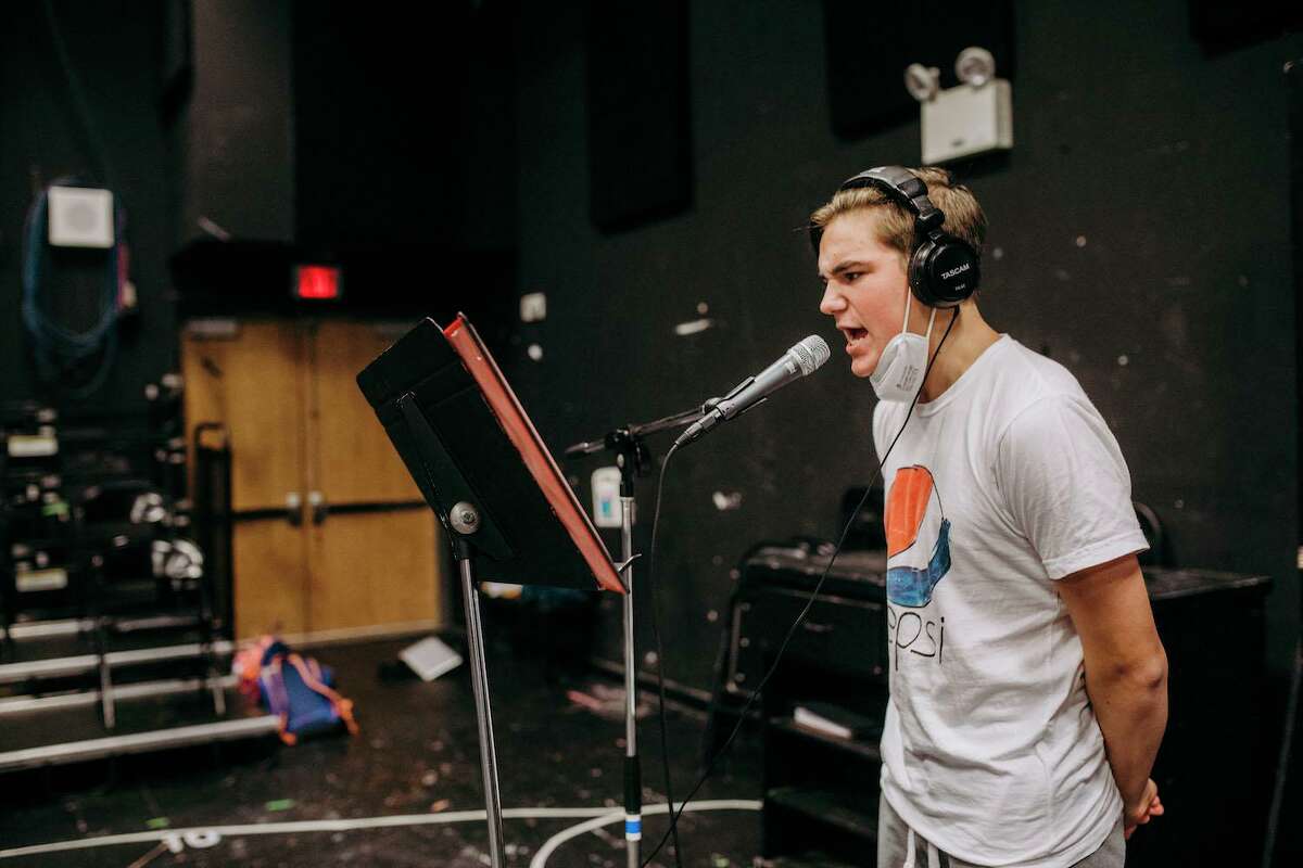 Colin Konstanty, with the Staples Players, rehearses for the troupe's three radio shows this fall.