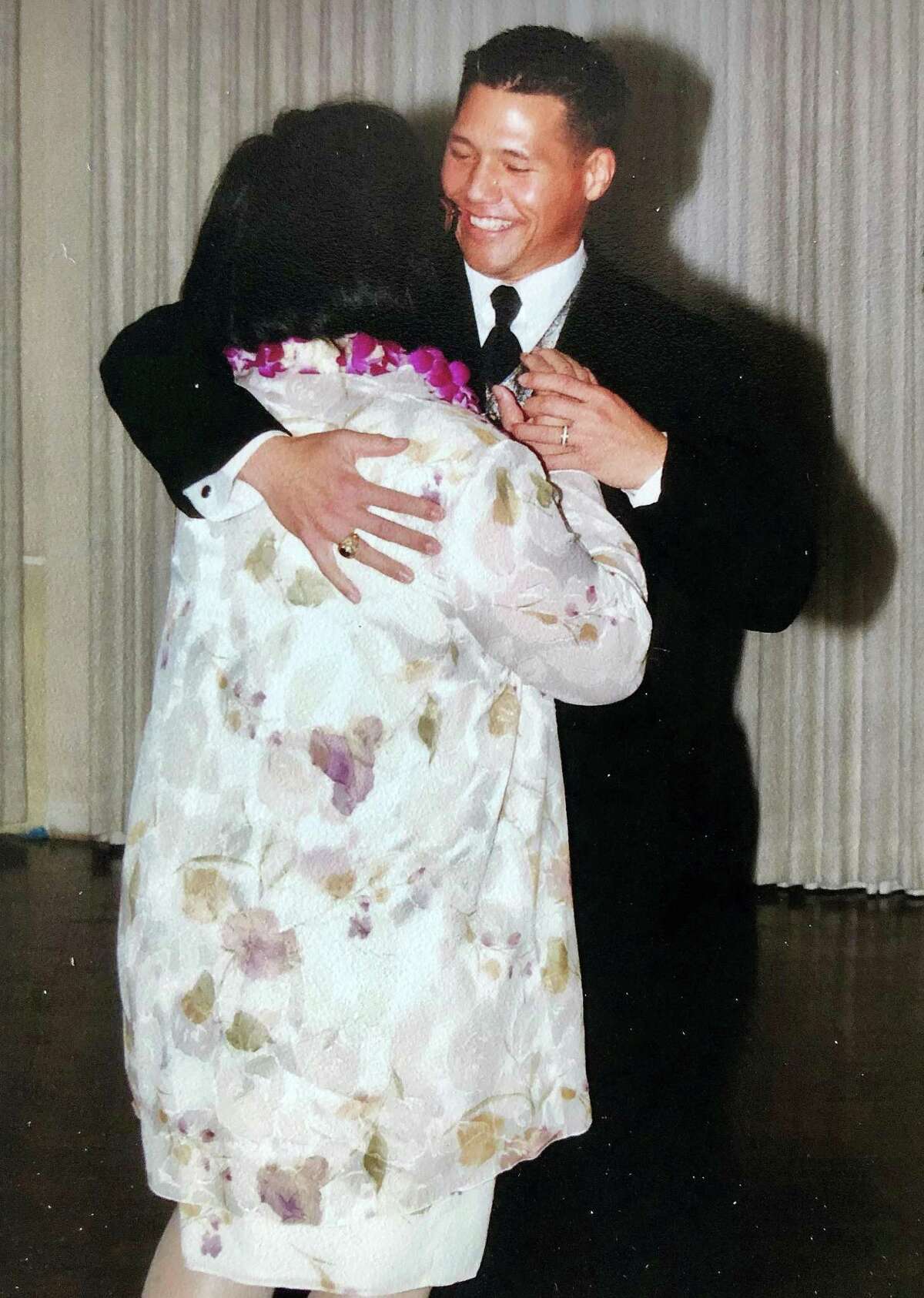 Melton gets a dance with his mom before she passed away in November 2015.