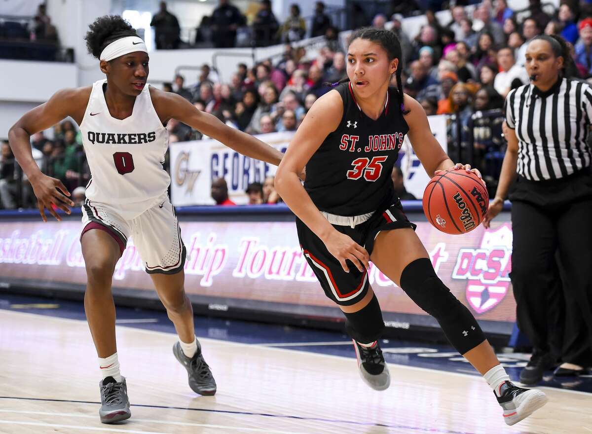 WASHINGTON, DC - MARCH 1: Azzi Fudd #35 of St. John's dribbles in front of Jadyn Donovan #0 of Sidwell Friends during the first half at George Washington University in Washington, DC on March 1, 2020. (Photo by Will Newton for The Washington Post via Getty Images)