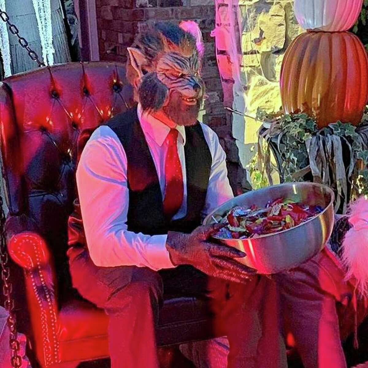 Jeff Garde, dressed as a werewolf, giving candy to trick-or-treaters in 2018. The Glen Carbon goes all out for their annual Halloween display at 54 Oakshire Drive West in Glen Carbon.