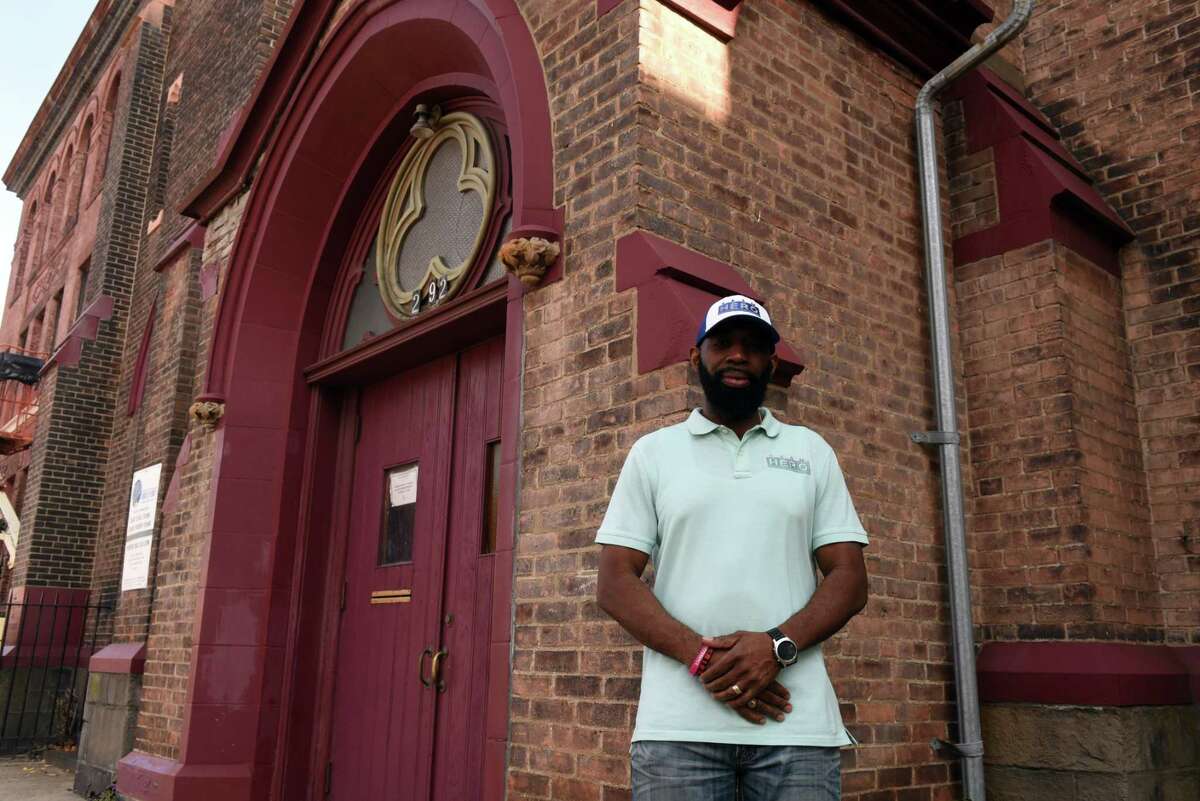 Jerry Ford is pictured outside the United Ordained Church on Third Street where he serves as a deacon on Friday, Oct. 23, 2020, in Troy, N.Y. The community leader is working on the Souls to the Polls effort to get downtown Troy minority and other residents without cars out to early voting sites that are not easily accessible in Troy and Brunswick. (Will Waldron/Times Union)