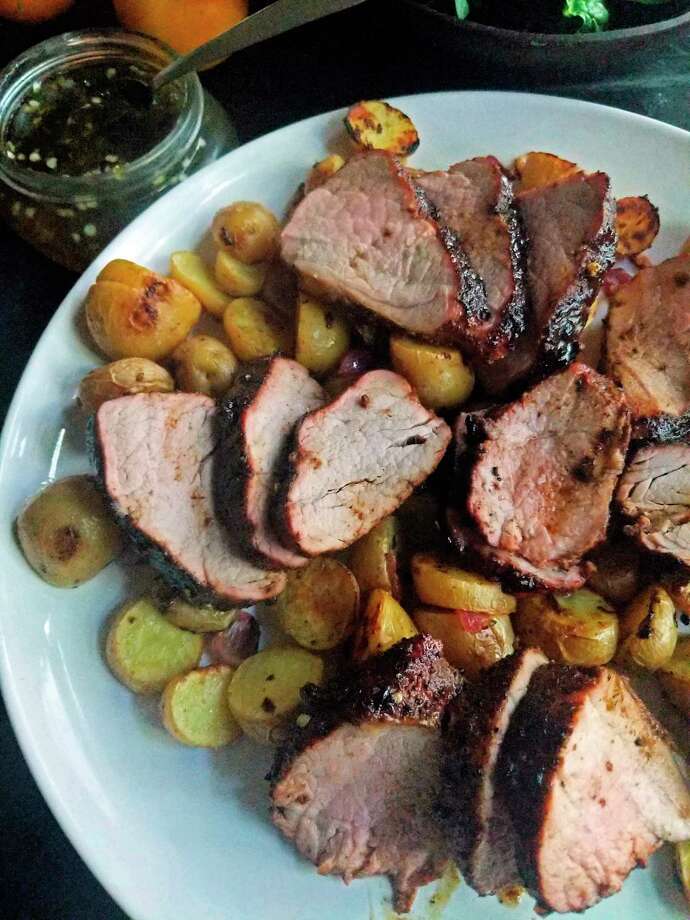 Pork roast is dusted in warm Mediterranean spices and glazed with homemade, spicy-sweet jalapeno jelly. (Gretchen McKay/TNS) / Pittsburgh Post-Gazette