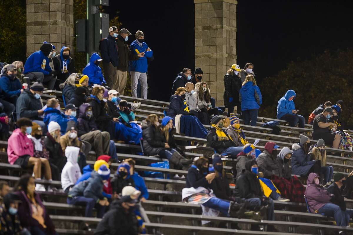Midland fans watch from the bleachers during the Chemics' game against Dow Friday, Oct. 23, 2020 at Midland Community Stadium. (Katy Kildee/kkildee@mdn.net)