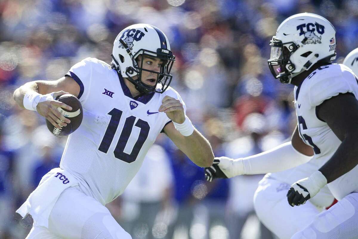 LAWRENCE, KS - OCTOBER 27: Michael Collins #10 of the TCU Horned Frogs runs the ball against the Kansas Jayhawks during the first half at Memorial Stadium on October 27, 2018 in Lawrence, Kansas. (Photo by Brian Davidson/Getty Images)