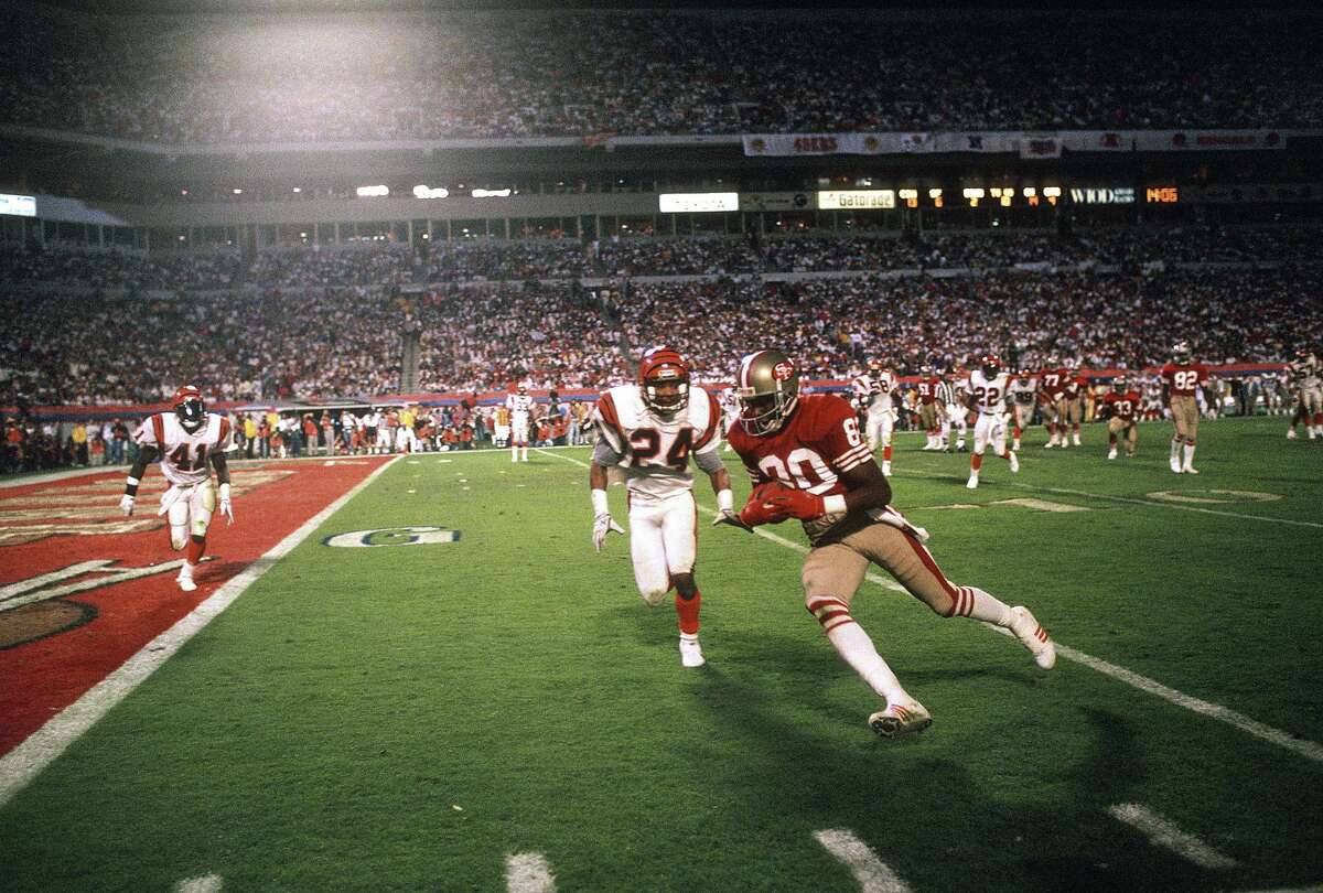 Julain Edelman, above, the Super Bowl MVP of 2019, has tried to emulate the work ethic of Jerry Rice, the Super Bowl MVP in 1989, shown at left, scoring against the Bengals during Super Bowl XXIII on January 22, 1989.