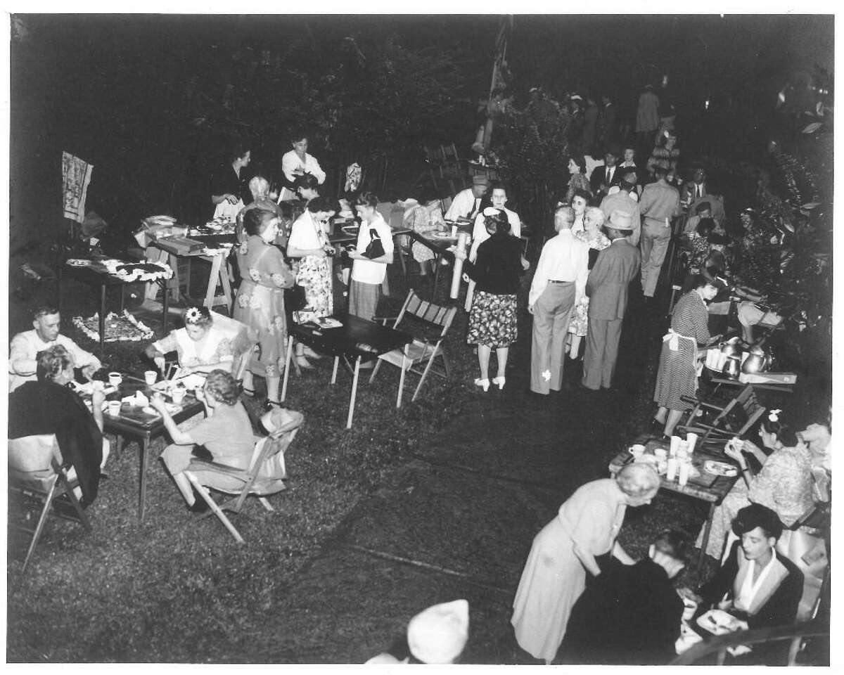 Revelers gather for the Conservation Society’s River Festival in 1941, a forerunner of the modern Night in Old San Antonio. NIOSA, which is a major event during San Antonio's annual Fiesta in the spring, was cancelled along with all of Fiesta in 2020 because of the coronavirus pandemic, but the Conservation Society negotiated a much smaller fall festival with limited attendance for Nov. 6 that's much closer to the original festivals in the 1940s.