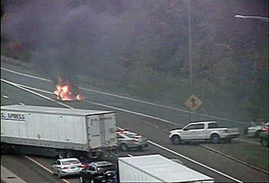 A vehicle fire has closed two lanes of I-95 on Saturday morning on Oct. 24, 2020. The fire, reported at 9:40 a.m. has closed the southbound right and center lanes between exits 41 and 40. Photo: CT DOT Traffic Cam