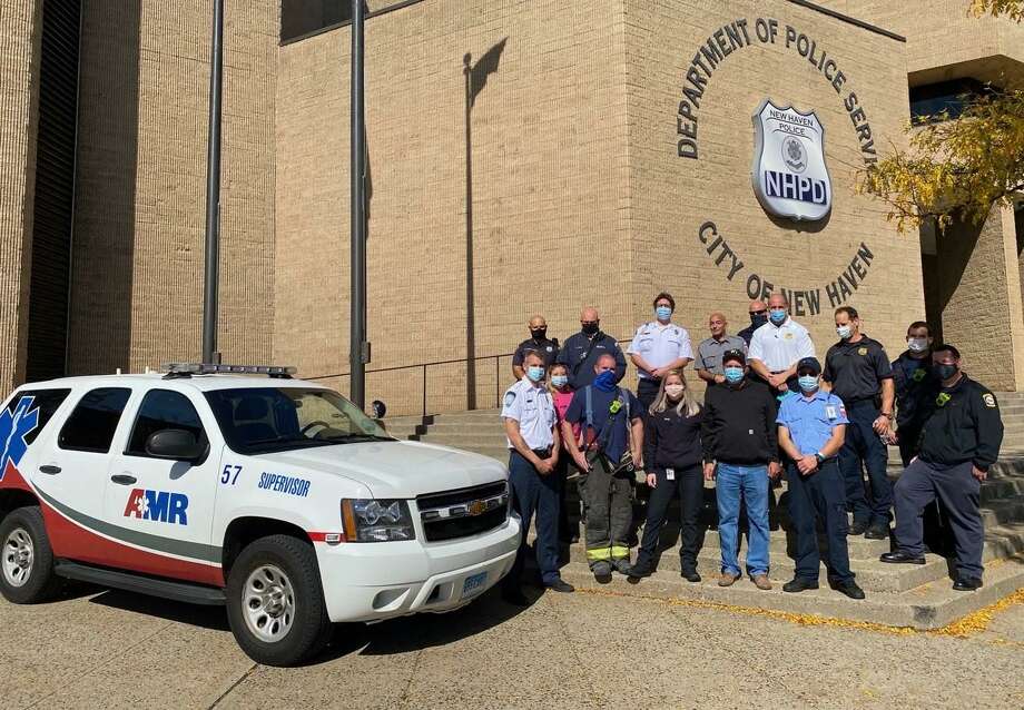 Thomas Mattesen, a truck driver seriously injured in a May 9 crash, visited New Haven Police Headquarters Oct. 15 to personally thank the police, firefighters and American Medical Response personnel who saved his life. Photo: Contributed Photo / New Haven Police / New Haven Register Contributed