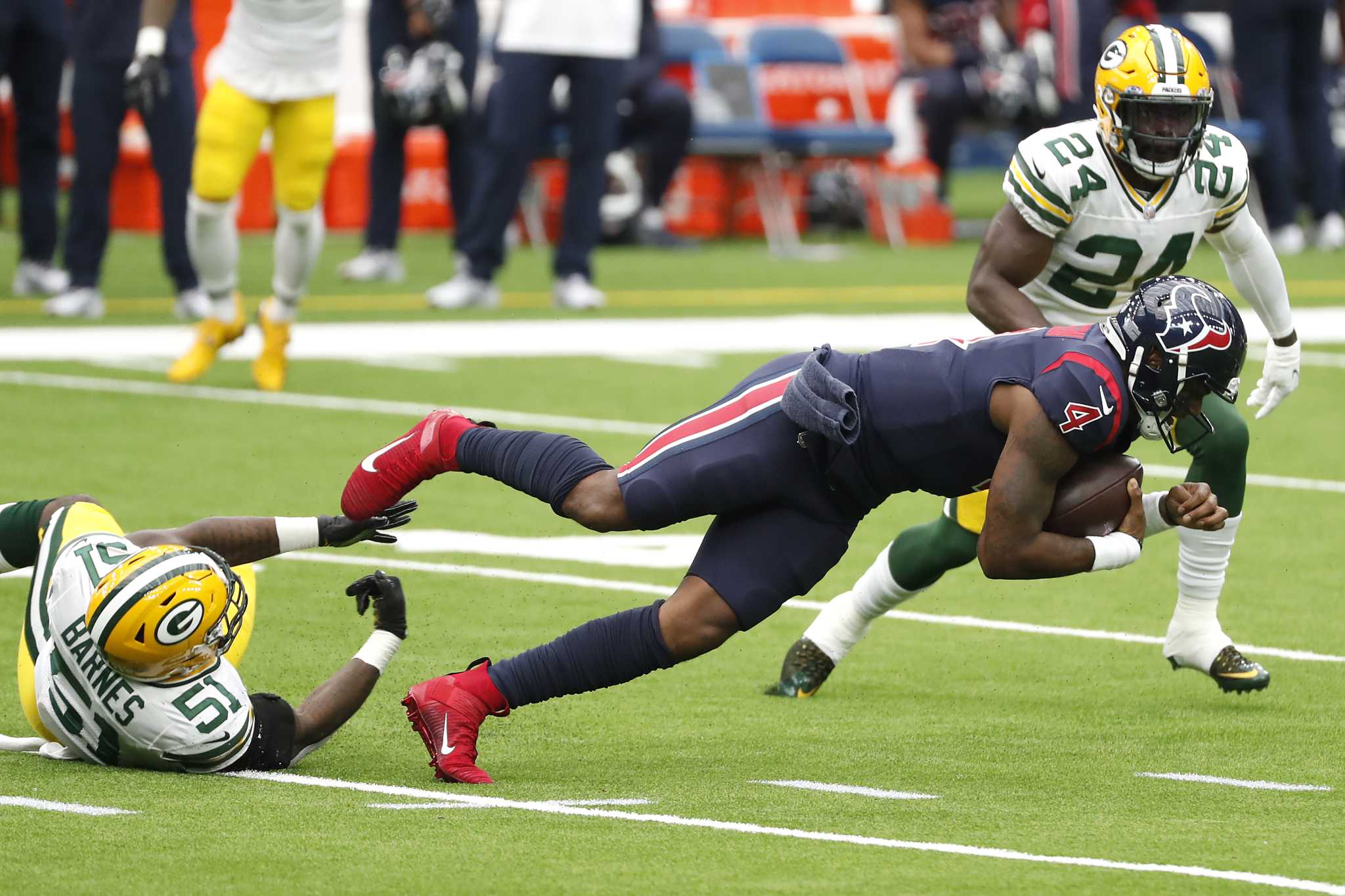 Green Bay Packers' Krys Barnes runs a drill at the NFL football