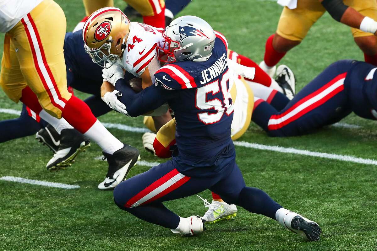 Kyle Juszczyk #44 of the San Francisco 49ers scores a touchdown during the first half of a game against the New England Patriots on October 25, 2020 in Foxborough, Massachusetts.