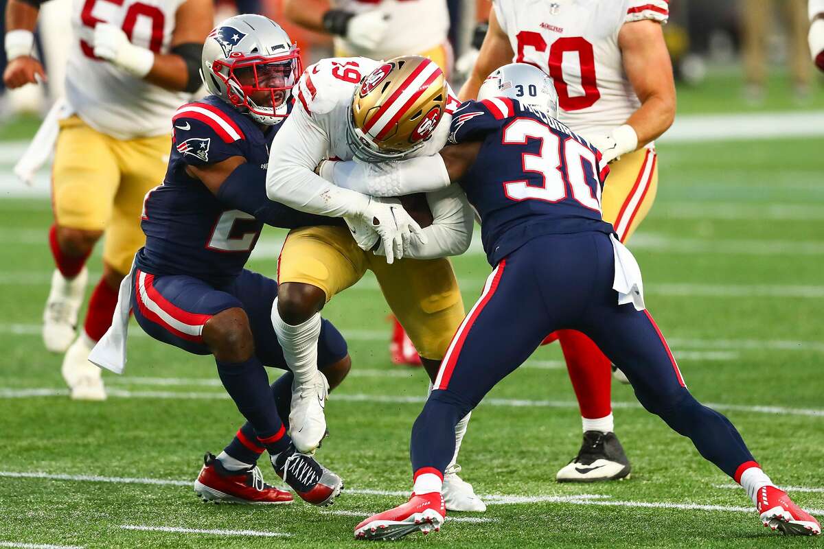 Deebo Samuel #19 of the San Francisco 49ers is tackled with the ball during a game against the New England Patriots on October 25, 2020 in Foxborough, Massachusetts.