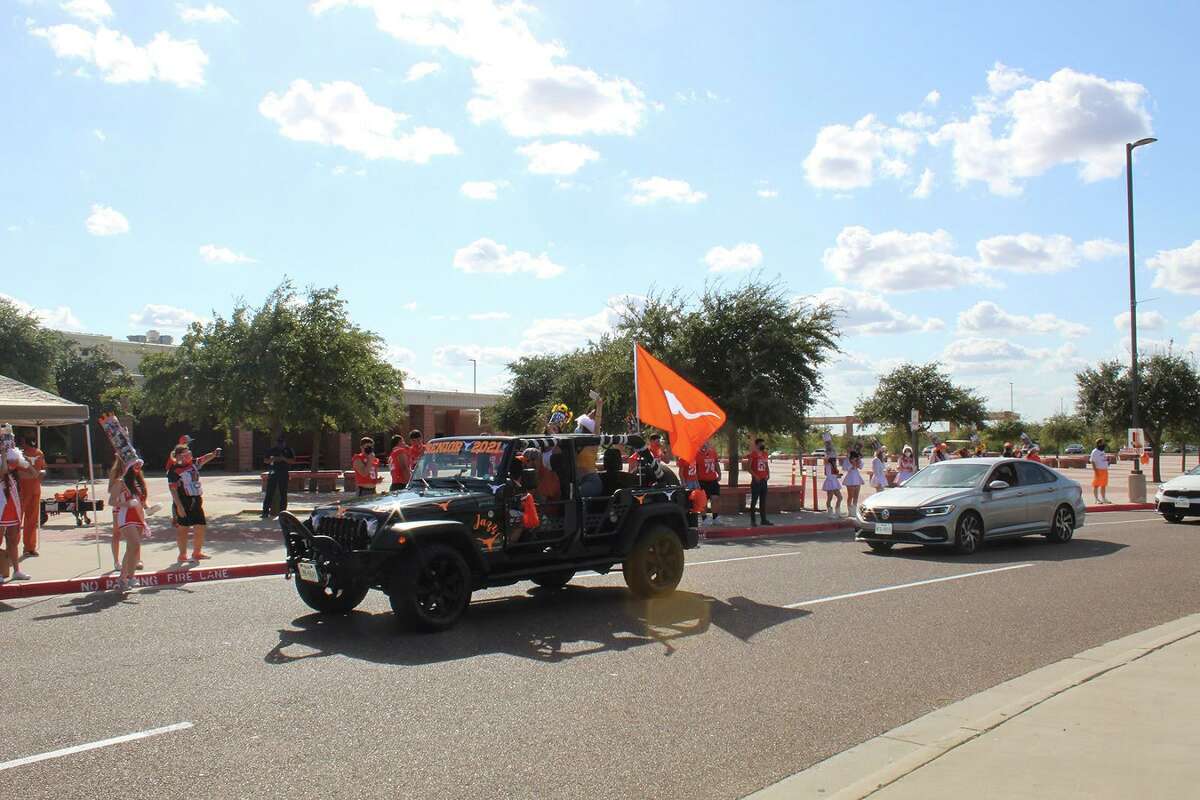 United seniors drive through campus during a spirit parade.
