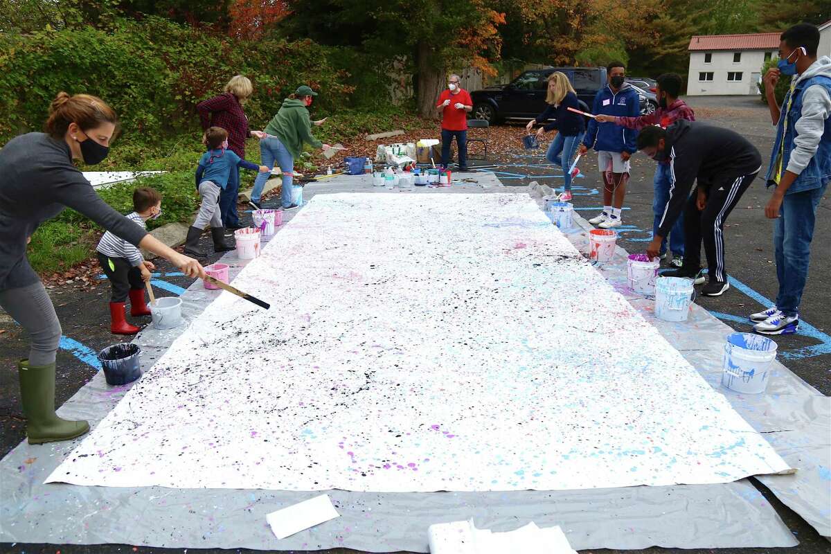 The enormous canvas used for the abstract mural painting at MoCA Westport on Saturday, Oct. 24, 2020, in Westport, Conn.
