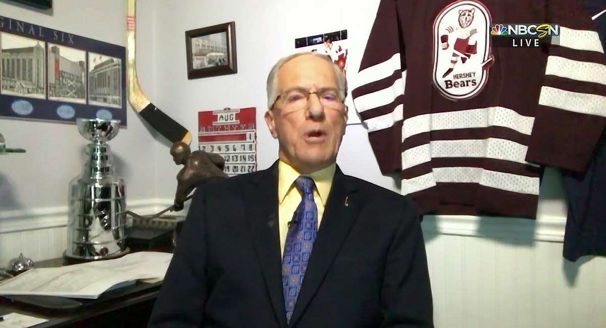 To pay homage to his hockey roots, Mike "Doc" Emrick hung various minor league sweaters behind him during his on-camera appearances during the 2020 Stanley Cup playoffs. A Hershey Bears jersey serves as the backdrop in this photo. (NBC Sports)