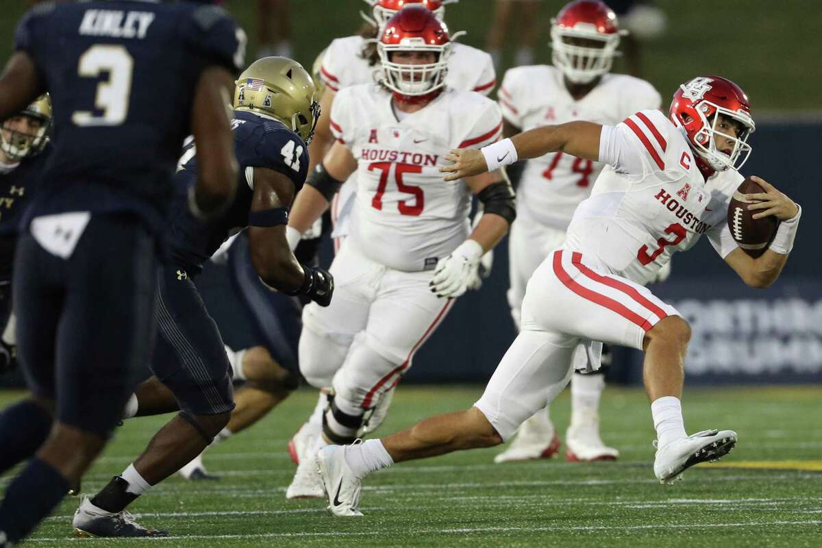 Quarterback Clayton Tune showed Navy he isn’t afraid to carry the ball in UH’s 37-21 victory at Annapolis, Md., on Saturday.