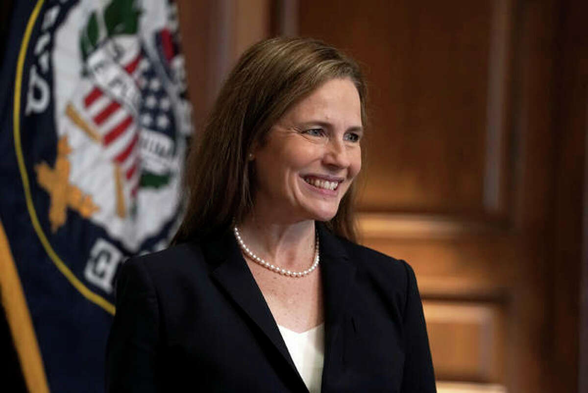 Supreme Court nominee Amy Coney Barrett, meets with Sen. Martha McSally, R-Ariz., Wednesday, Oct. 21, 2020, on Capitol Hill in Washington. Barrett was confirmed by the Senate Monday night, in a 52-48 vote. Illinois’ Sens. Dick Durbin and Tammy Duckworth, both Democrats, voted against the confirmation.