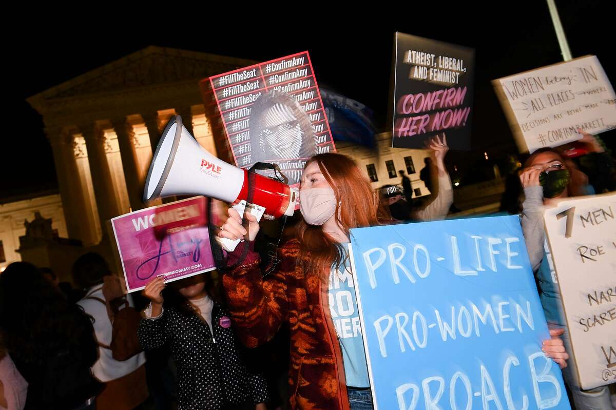 Pro Life activists and Barrett supporters celebrate outside the Supreme Court.