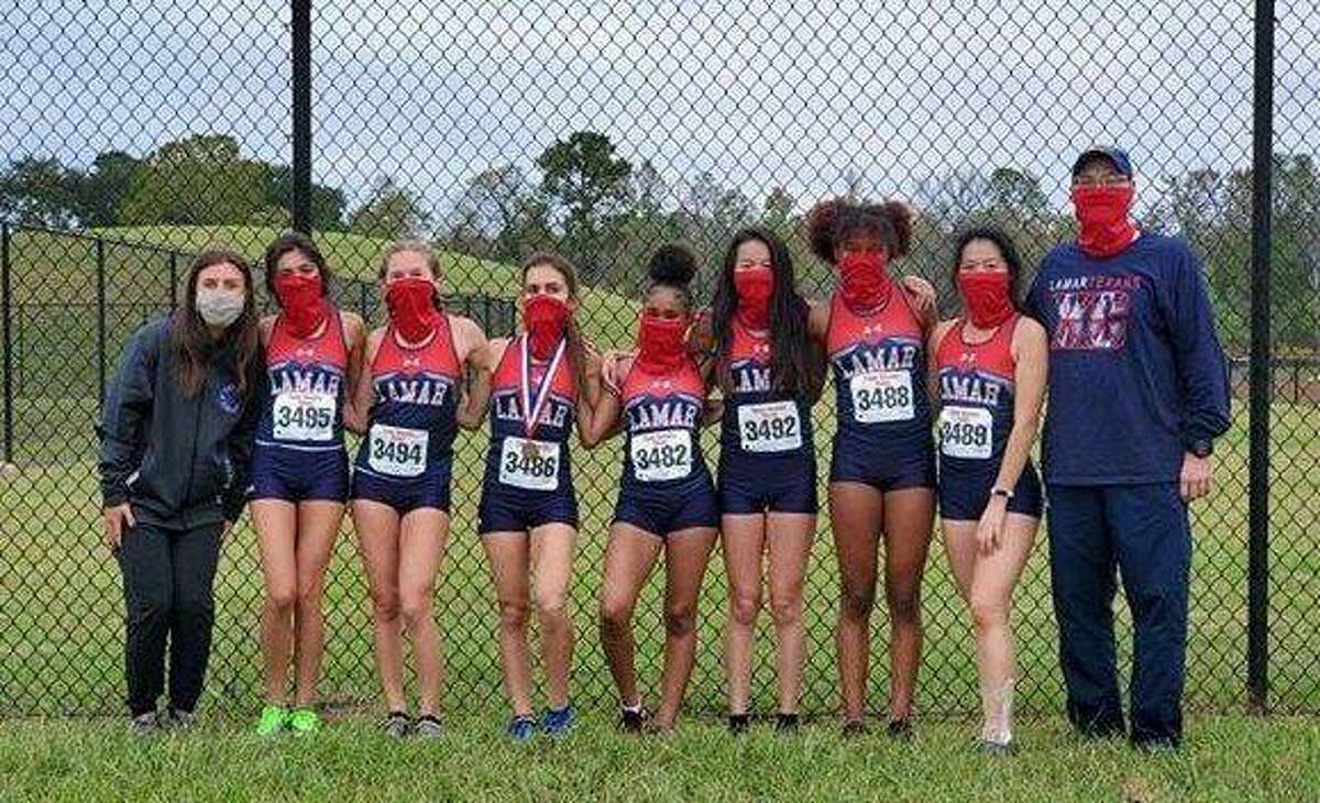 The Lamar girls cross country team of Sofia Diaz, Dina Owers, Skylar Park, Maryah Hampton, Olivia Pare, Lauren Koong and Sydney Balogun won the District 18-6A championship.
