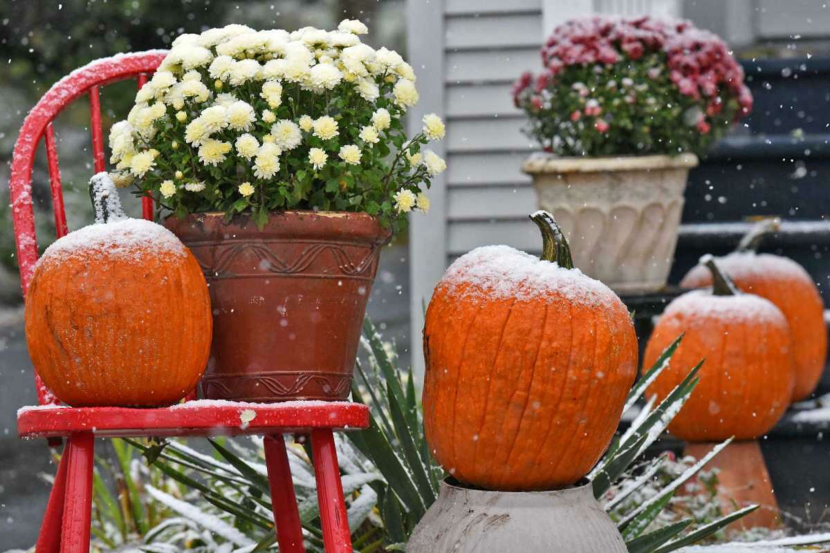 Fresh snow decorates a Halloween display Oct. 27, 2016 in Troy, NY.