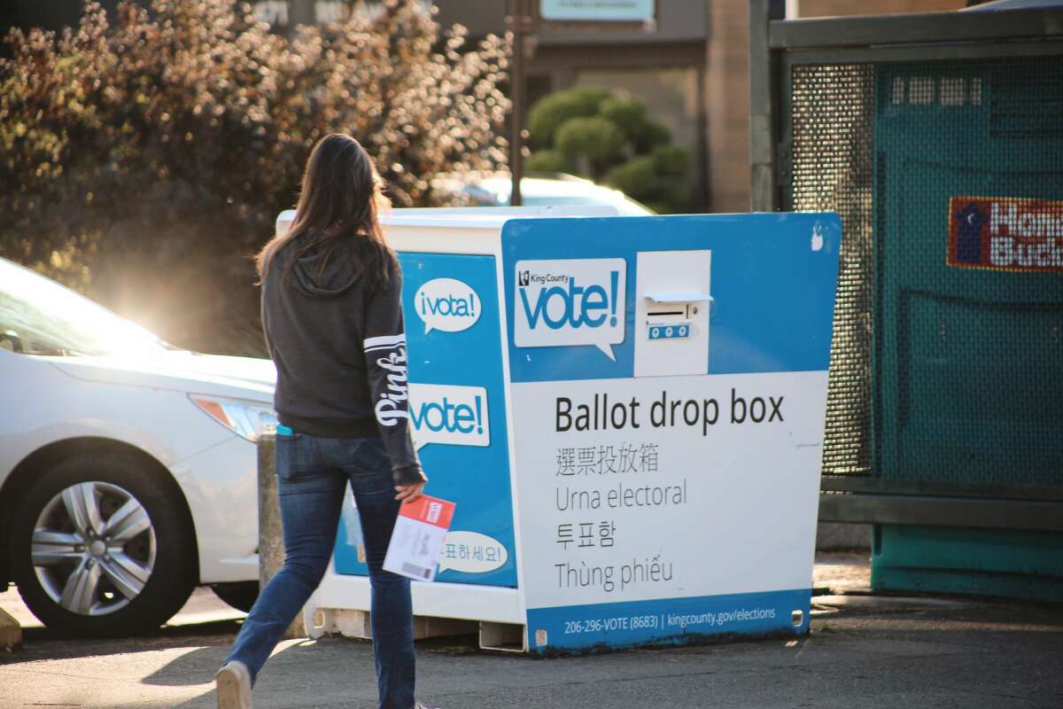 Washington voters drop off their ballots in Seattle, Washington prior to the Nov. 3 election.