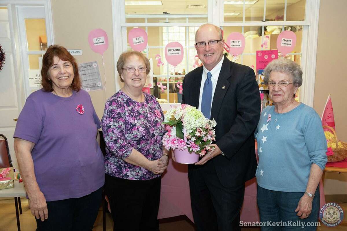 State Sen. Kevin Kelly with, left to right, Christine Crawford, Rose Goldspink and Marge Keene from The Valley Goes Pink at the 2019 Shelton Senior Center Health and Wellness Fair. The organization shared information about breast cancer early detection and awareness at the fair.