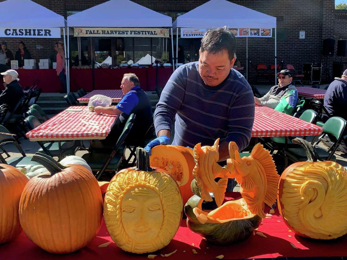 Torrington store celebrating Halloween with pumpkin carver, trickor