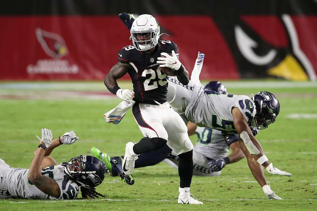 Running back Chase Edmonds (29) of the Arizona Cardinals rushes the football against the Seattle Seahawks on Sunday, Oct. 25, 2020 at State Farm Stadium in Glendale, Arizona. (Christian Petersen/Getty Images/TNS)