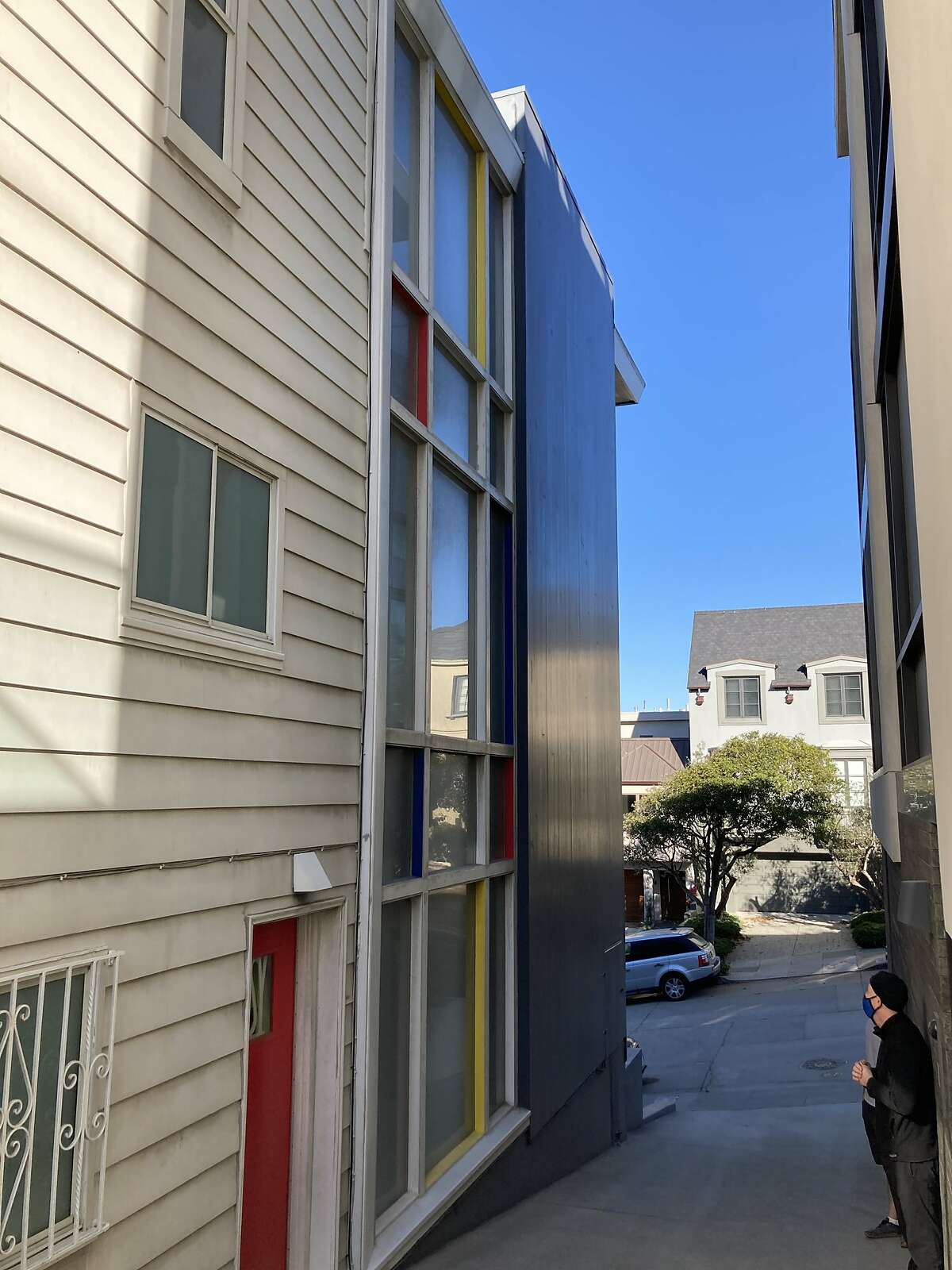 Writer, poet and record producer David Breskin's house on Russian Hill in San Francisco features a three-story window painted in Mondrian style and colors.