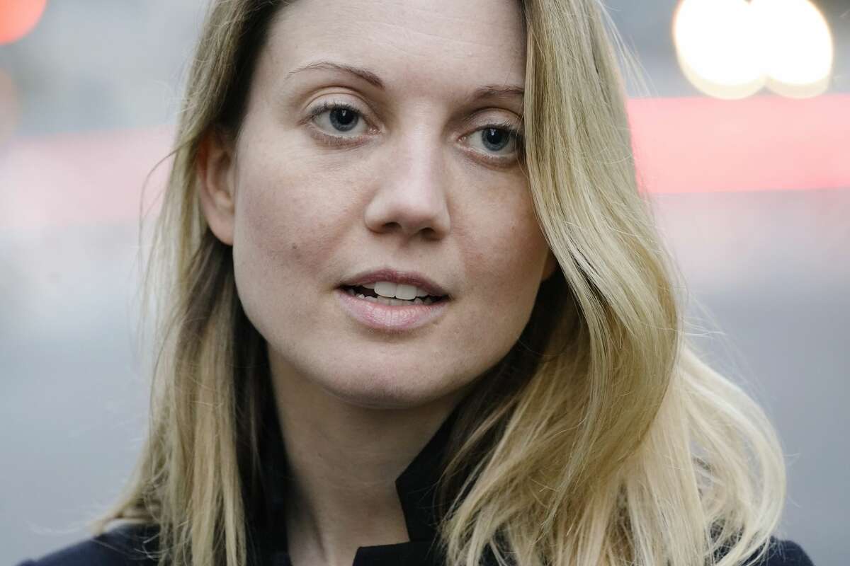 Nicki Clyne speaks outside Brooklyn federal court following the sentencing hearing for self-improvement guru Keith Raniere Tuesday, Oct. 27, 2020, in New York. Raniere, the NXIVM leader, was sentenced to 120 years. (AP Photo/Frank Franklin II)