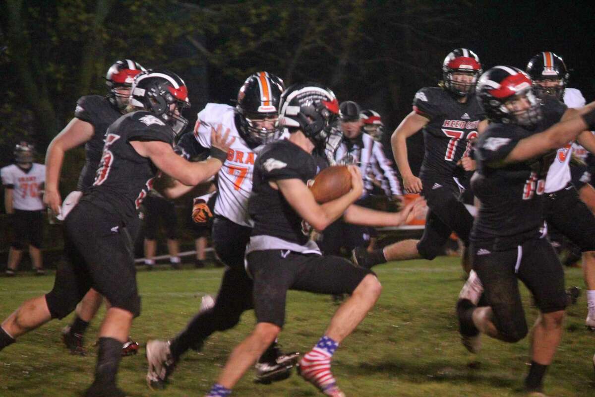 Reed City running back Landon Tomanski looks for running room against Grant on Friday. (Herald Review photo/John Raffel)