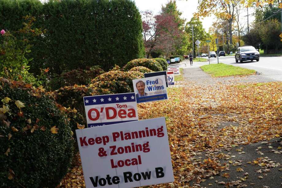 A plea to keep control of zoning in local hands is part of a group of Republican campaign signs on the corner of Church Street and South Avenue in New Canaan Tuesday, Oct. 28, 2020. Efforts Republicans fear will regionalize zoning were discussed at a Zoom meeting that night. Photo: Grace Duffield Hearst Connecticut Media /
