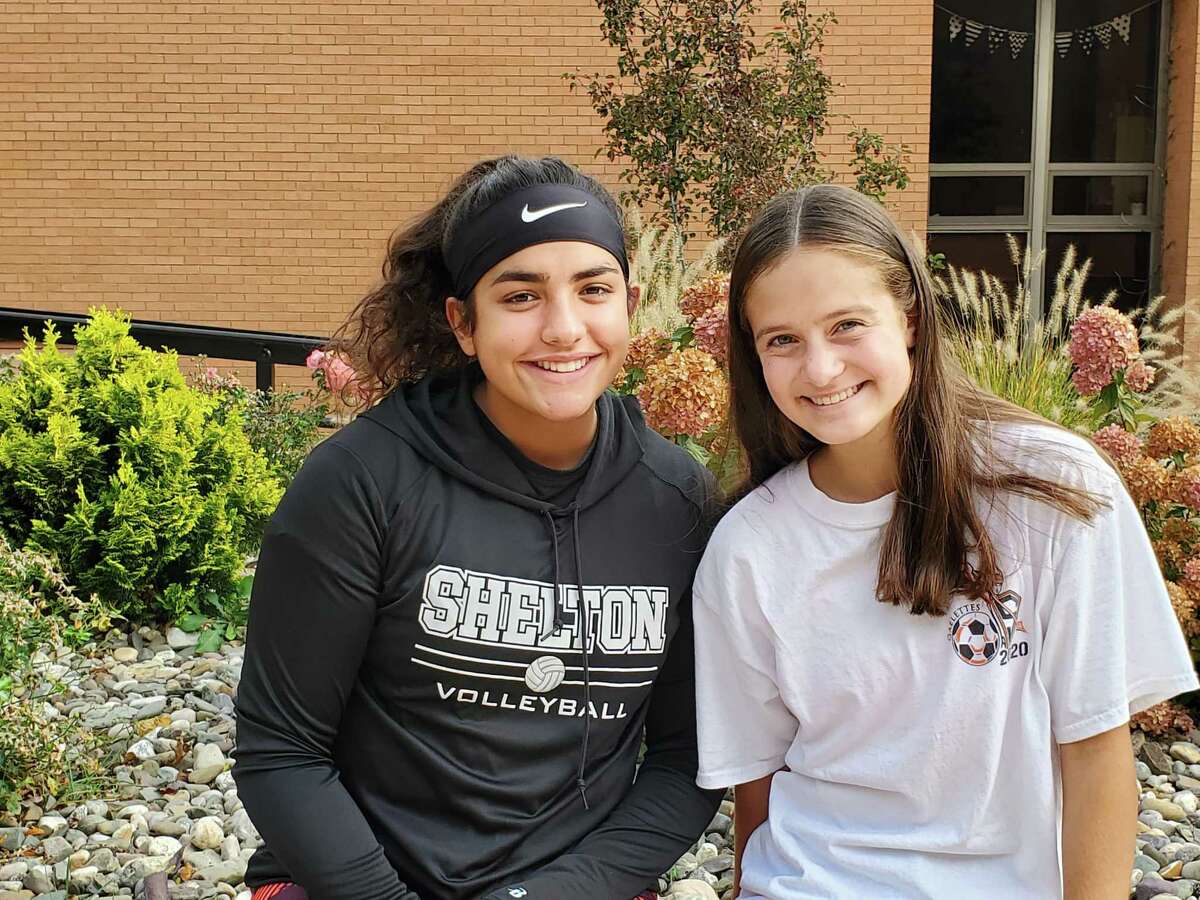 Jess Jayakar and Liz Porto were recognized for excellence in the classroom and in athletics.