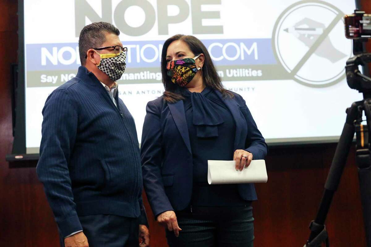 Richard Perez, San Antonio Chamber of Commerce president, and Cristina Aldrete, North SanAntonio Chamber of Commerce president, chat as heads of local chambers of commerce voice their opposition to the Recall CPS petition on Oct. 28, 2020.