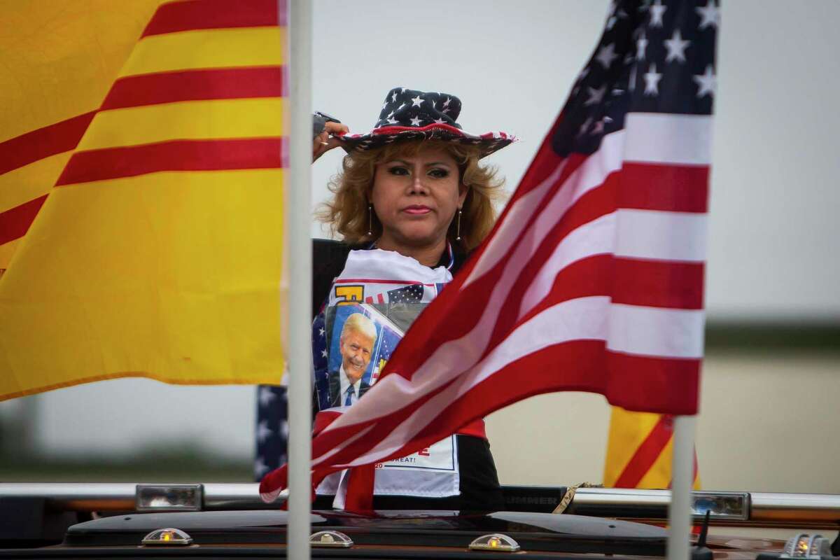 Donald Trump supporters gather at the Dakao Plaza for a Trump Train Rally on Sunday, Oct. 25, 2020.