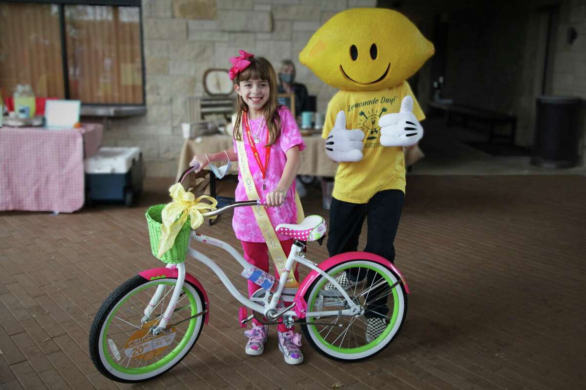 Recognized as the Lemonade Day Houston 2020 Youth Entrepreneur of the Year, 9-year-old Sugar Land resident Sabrina Roesler receives a free bicycle.