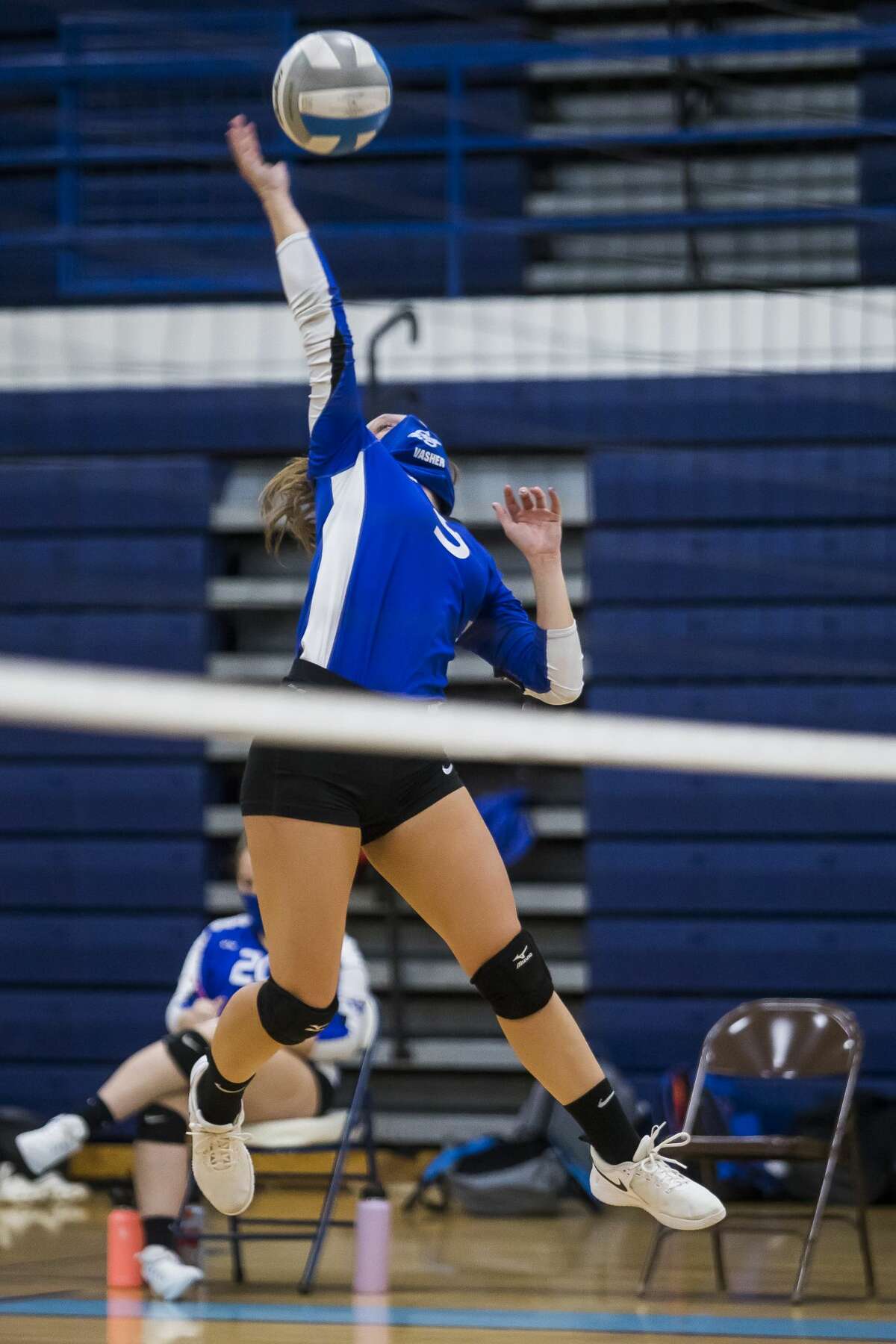 Gladwin's Taylor Vasher spikes the ball in a match against Meridian during a quad meet Wednesday, Oct. 28, 2020 at Meridian Early College High School. (Katy Kildee/kkildee@mdn.net)