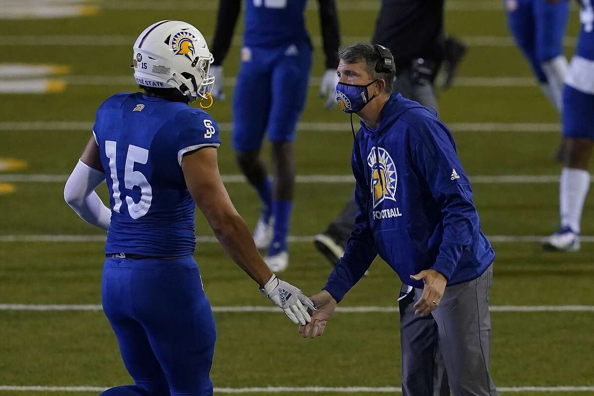 San Jose State head coach Brent Brennan celebrates with Dominick Mazotti during the second half against visiting Air Force last Saturday.