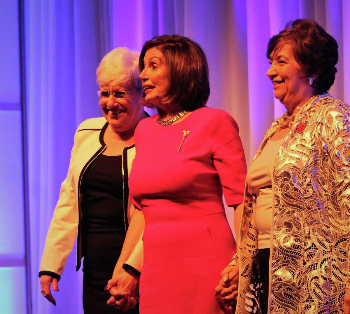 In a 2019 file photo, Nancy Wyman, then-Democratic state chairwoman, left, joined Speaker of the U.S. House Nancy Pelosi, center, and Nancy DiNardo, right, who has since returned to the head the Democratic State Central Committee.