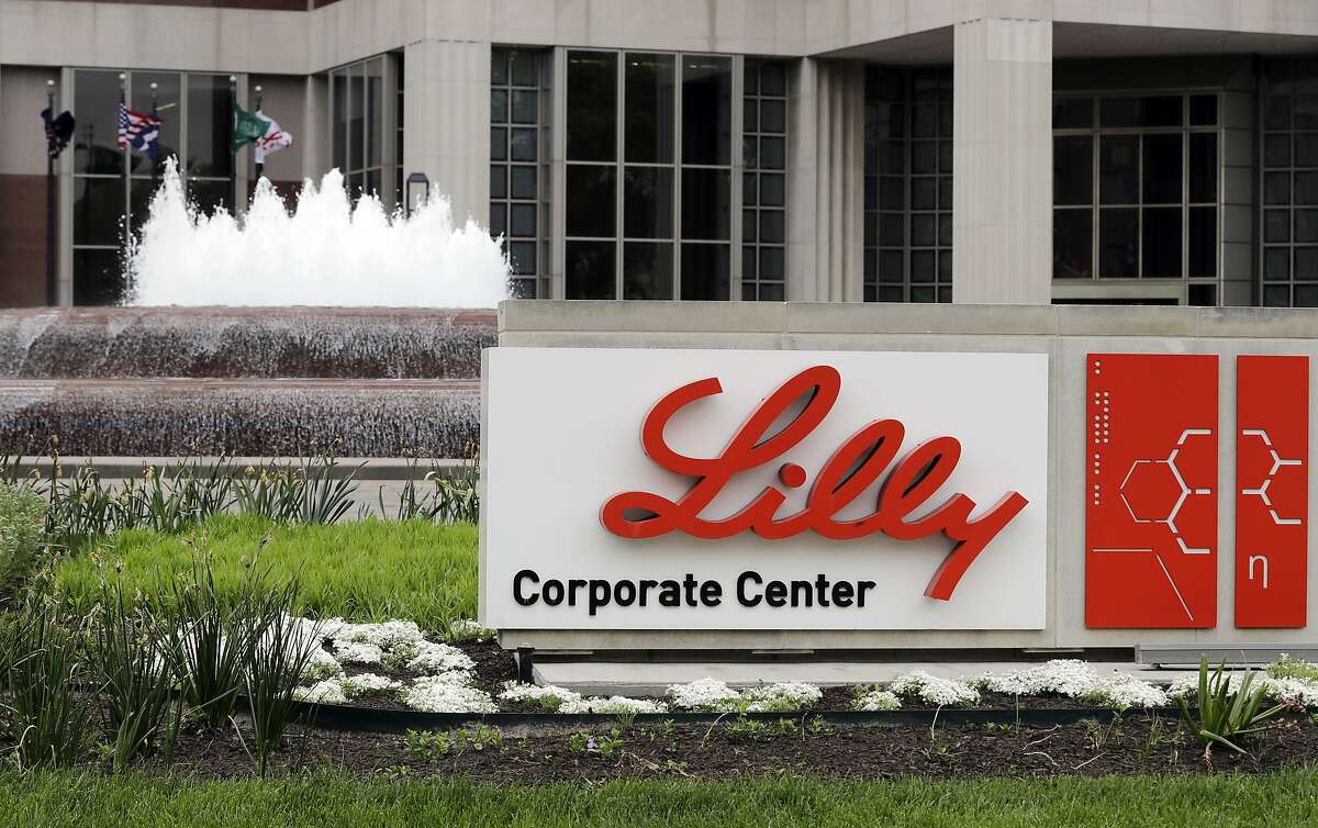 An April 26, 2017, file photo showing Eli Lilly corporate headquarters in Indianapolis. Eli Lilly continues to back a potential COVID-19 treatment despite research showing that it may not work on hospitalized patients. The drugmaker said Tuesday, Oct. 27, 2020, that It remains confident that its drug may stop COVID from developing in other patients.