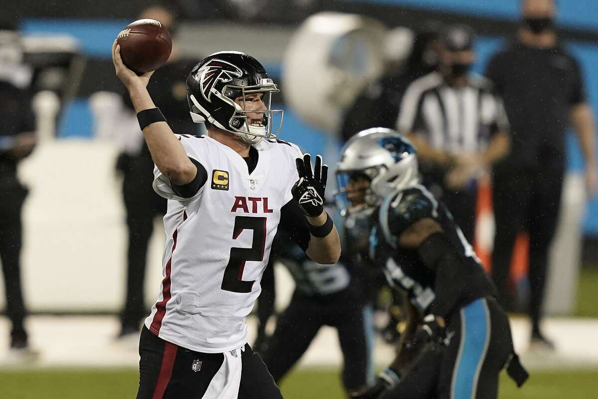 Atlanta Falcons quarterback Matt Ryan passes against the Carolina Panthers in the first half of a win in Charlotte, N.C. Ryan threw for 281 yards and ran for a touchdown.