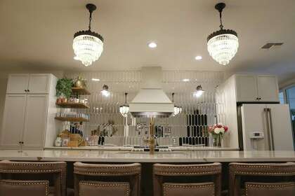 Kali Tripp said her favorite part of the kitchen is the two vintage, clear glass crystal pendant lights that were originally in the living room and dining room and now hang over the island.