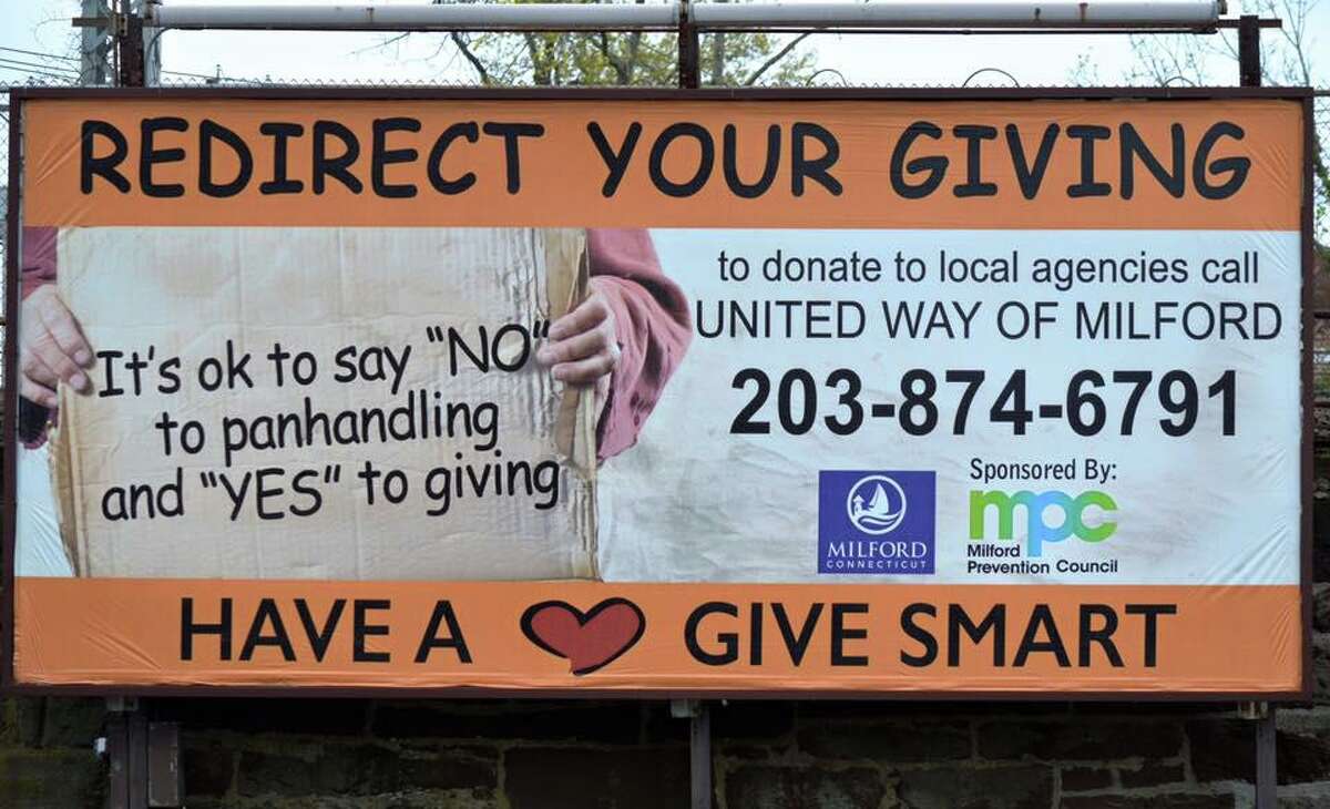 A billboard in Milford to encourage giving to charities that help the homeless