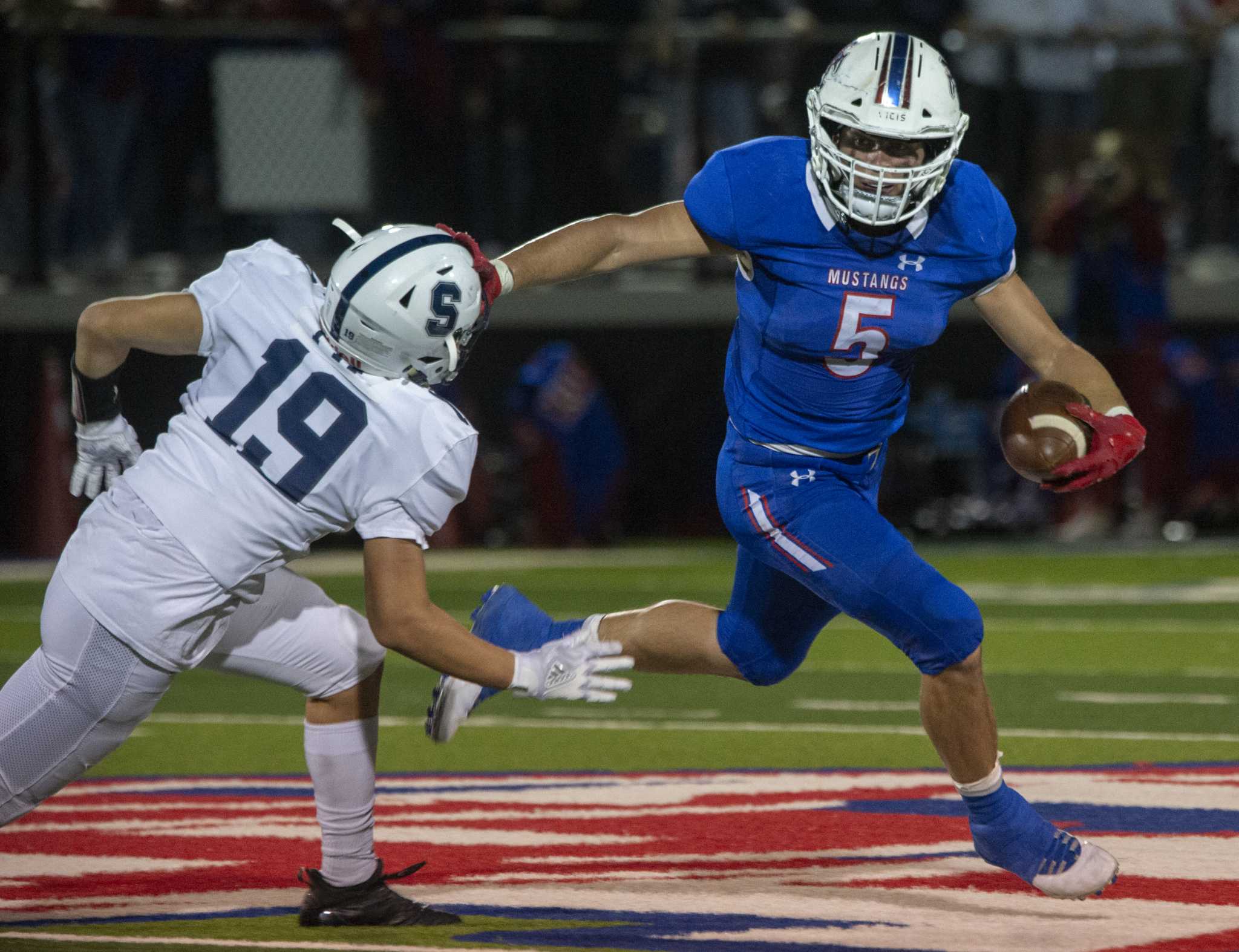 HS FOOTBALL Evans, defense lead MCS past All Saints