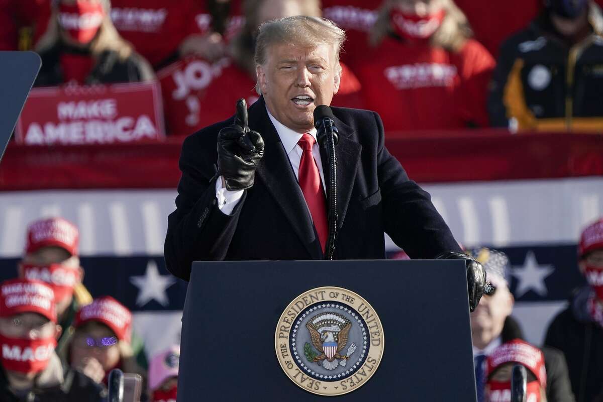 President Donald Trump speaks at a campaign rally Friday, Oct. 30, 2020, at the Austin Straubel Airport in Green Bay, Wis. (AP Photo/Morry Gash)
