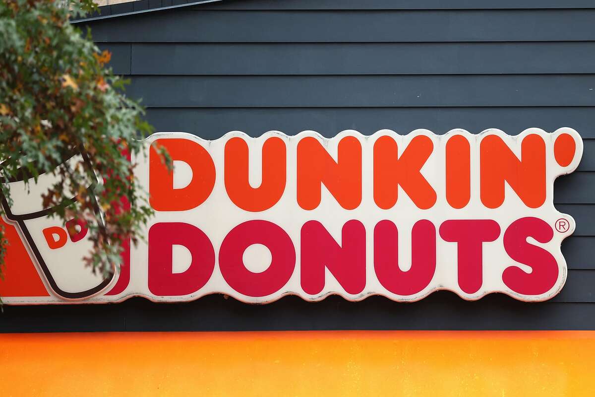 NEW YORK, NEW YORK - OCTOBER 26: A Dunkin' storefront sign is seen on October 26, 2020 in New York City. The Dunkin’ Brands, the parent company of the Dunkin’ and Baskin Robbins chains, is in negotiations to sell itself to Inspire Brand, a private equity-backed company. (Photo by Michael M. Santiago/Getty Images)