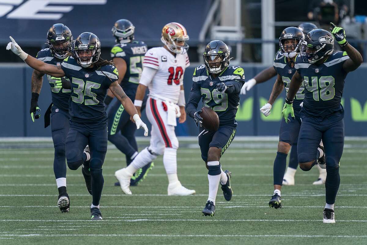 Jimmy Garoppolo, George Kittle limp off in 49ers' 37-27 loss to Seahawks