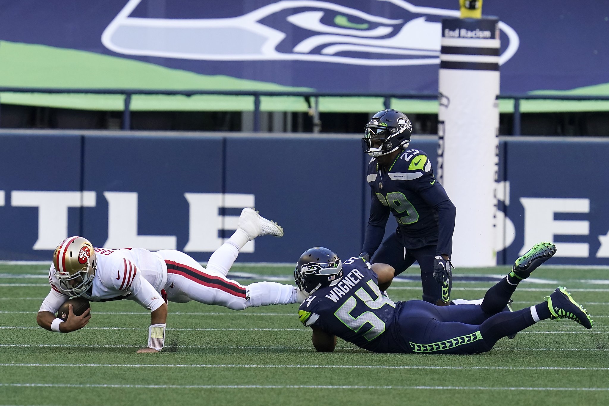 Jimmy Garoppolo, George Kittle limp off in 49ers' 37-27 loss to Seahawks