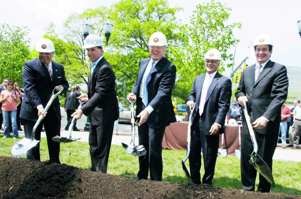 Donald Trump, center, joins from left, Connecticut Lt. Gov. Michael Fedele, development partners Thomas Rich and Louis Cappelli and Stamford Mayor Dannel Malloy on May 15, 2007 at the groundbreaking ceremony of Trump Parc in Stamford, Connecticut.