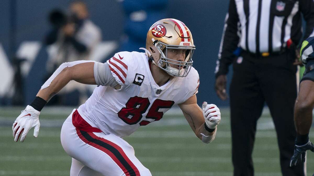 San Francisco 49ers tight end Charlie Woerner, left, and wide