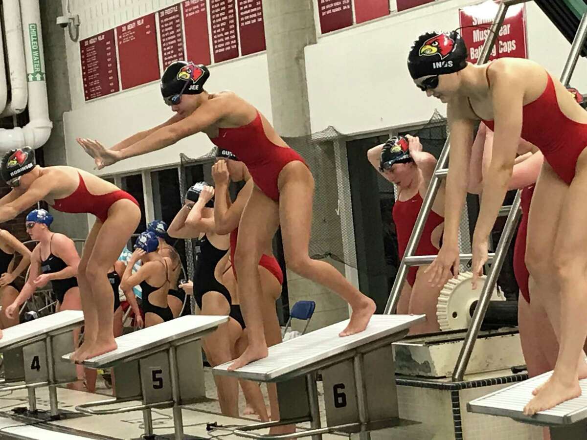 The Greenwich High School girls swimming team defeated rival Darien on Monday, November 2, 2020, in Greenwich, Connecticut.